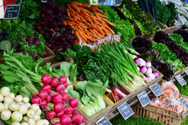 Produce stall at Victoria Farmers Market at Moss Street.